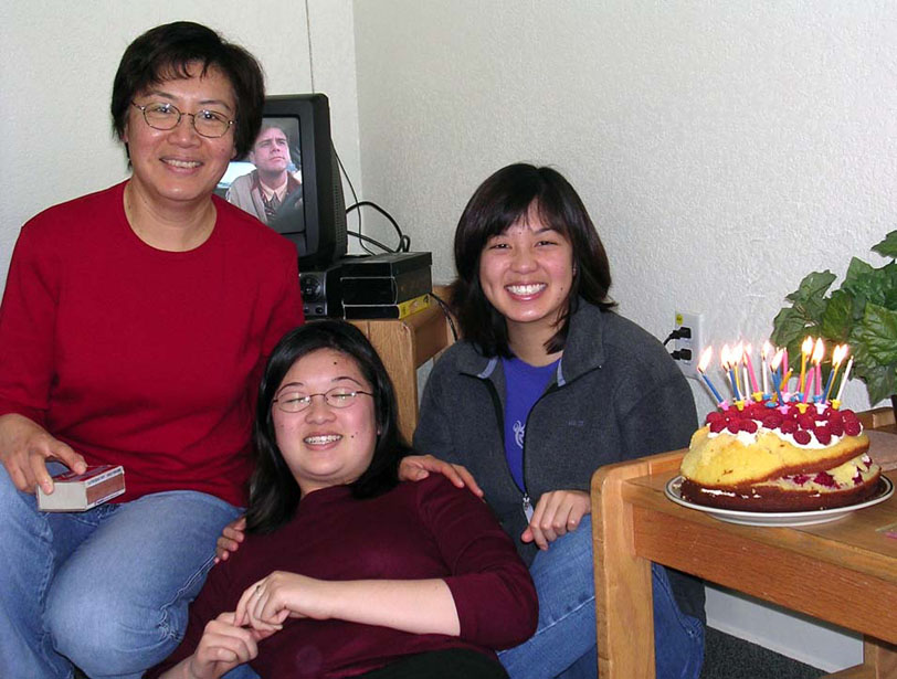 Posing with cake - Mommy, Lisa, Shra and Jim Carrey