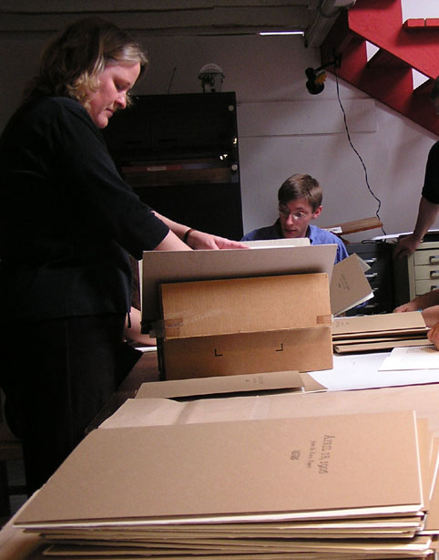 P5140007.Leah punching holes