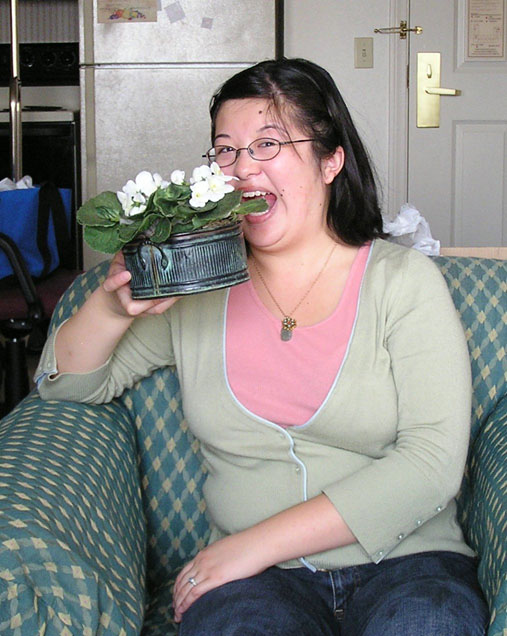 PB250136.Lisa eating flowerpot