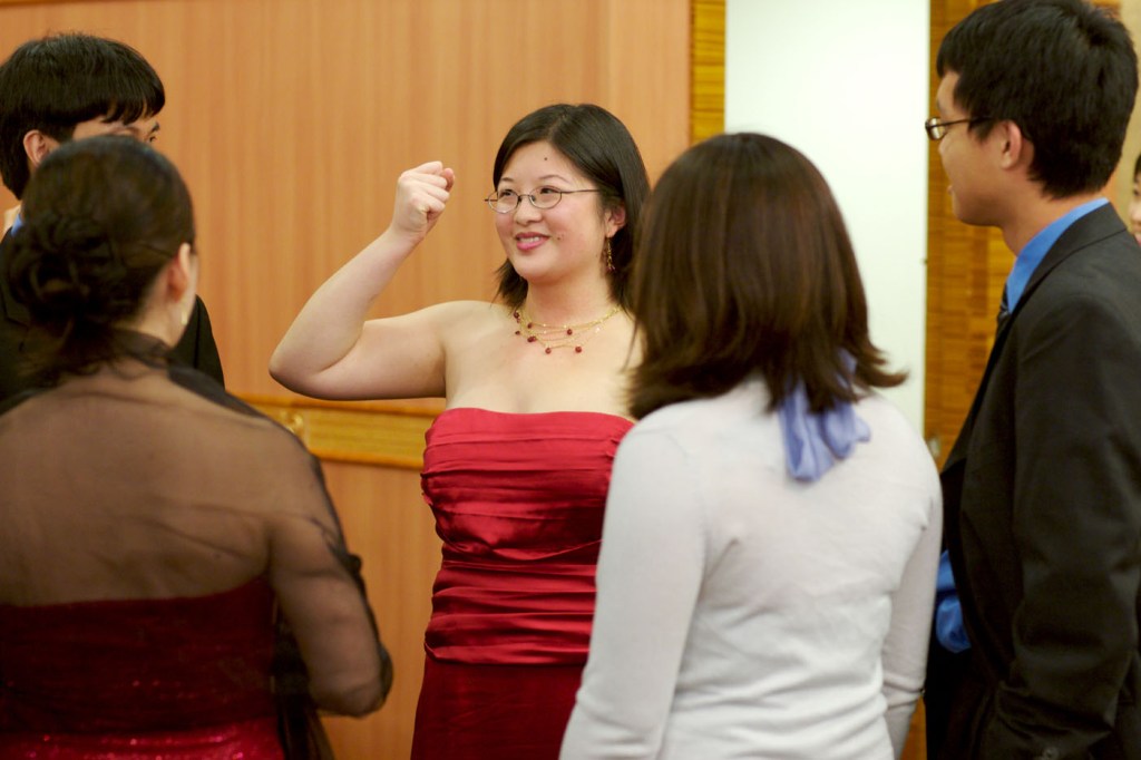 B - Lisa showing her muscles