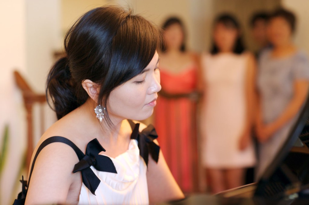 L - Emily playing piano