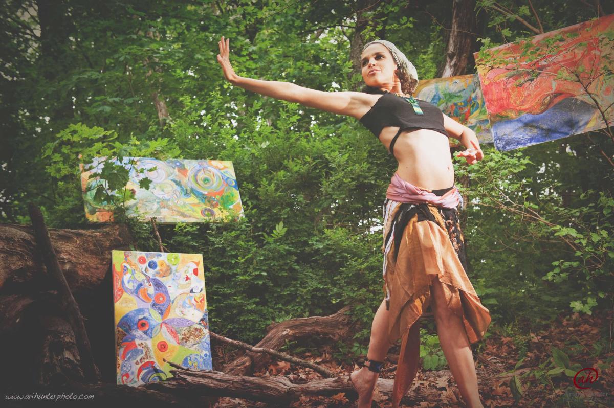 Dancing woman among art