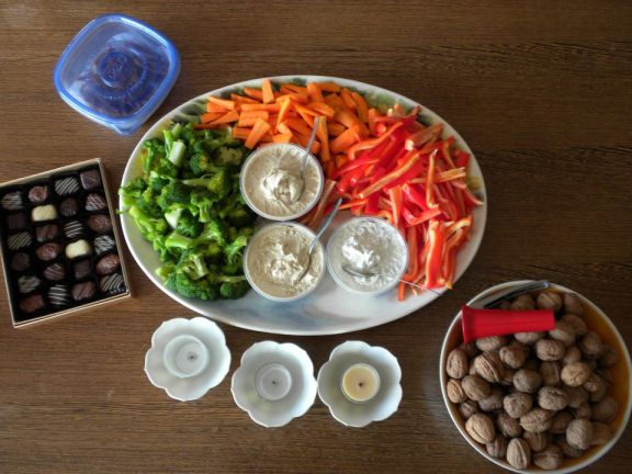 Crudités, See's chocolates, walnuts in shell.
