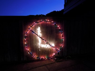 Christmas lights in the shape of a "no smoking" sign with an L in it