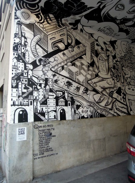 Parking-space walls and ceiling covered in B/W cartoony paintings