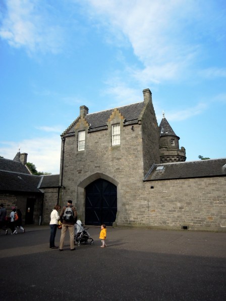 Family in one of the courtyards of the Palace of Holyrood. 