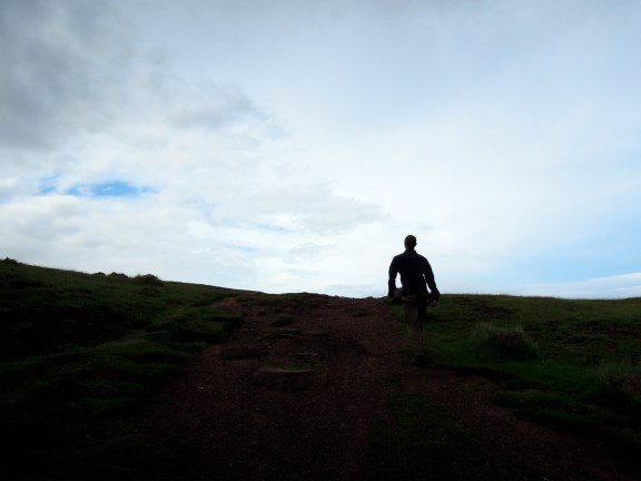 Erik silhouetted against the sky