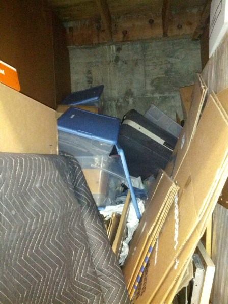 Messy storage unit with everything in a shambles
