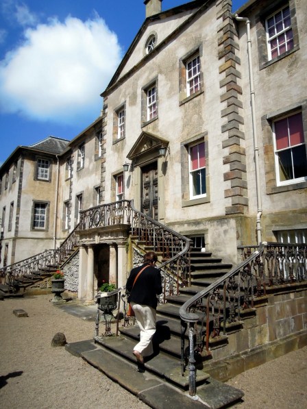 Our friendly guide going up the stairs to start the tour