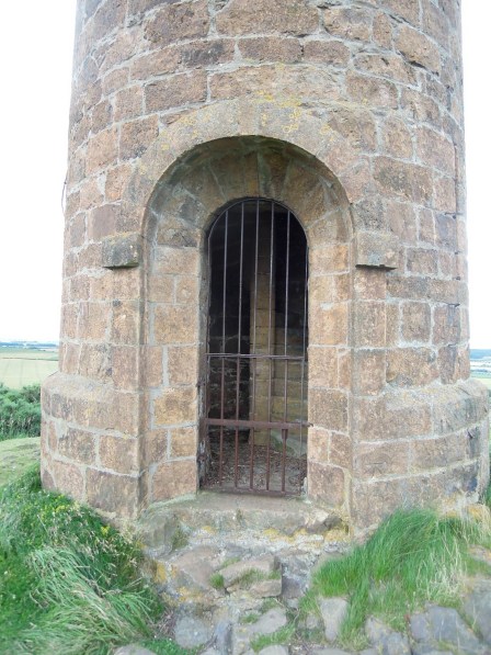 Gate barring the entrance to the monument