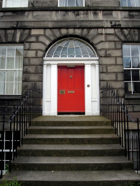One of Edinburgh's attractive red residential doors.