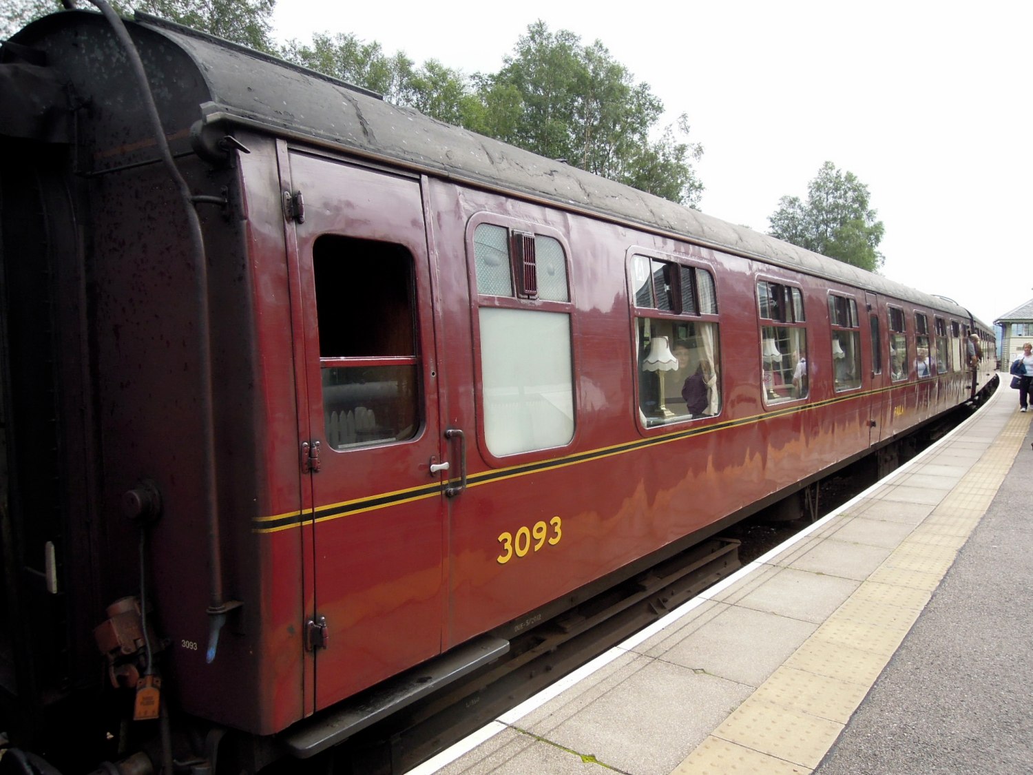 The distinctive red cars of the Jacobite Steam Train