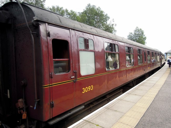 The distinctive red cars of the Jacobite Steam Train