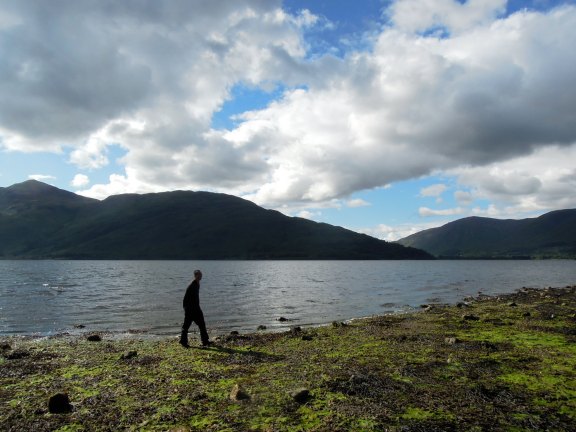 Erik walking Loch Linnhe and looking like the Chinese character for "person"