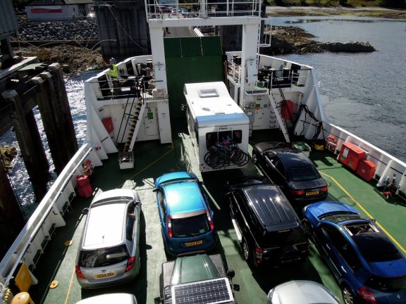 Lots of people drove their cars onto the ferry so they could drive around Skye. Tour buses too. We considered it but it was such a long drive to get to Mallaig in the first place, and Erik was still a little uneasy about the whole driving-on-the-left thing. It's just as well since we barely had any time on Skye as it was, and figuring out the roads would only have eaten further into it. Cars on the lower deck of the ferry