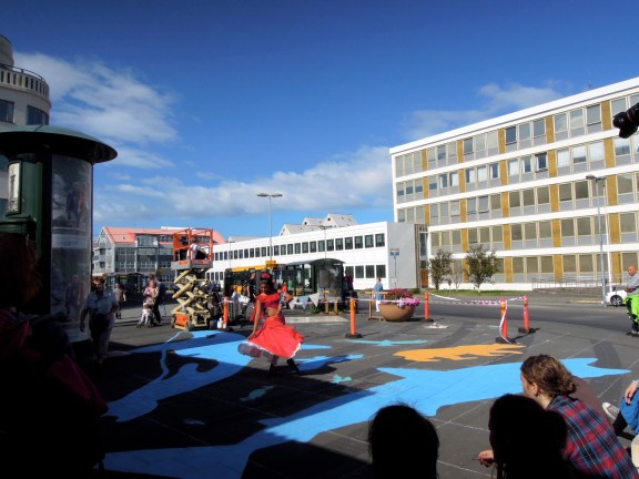Dancer in red outfit outdoors