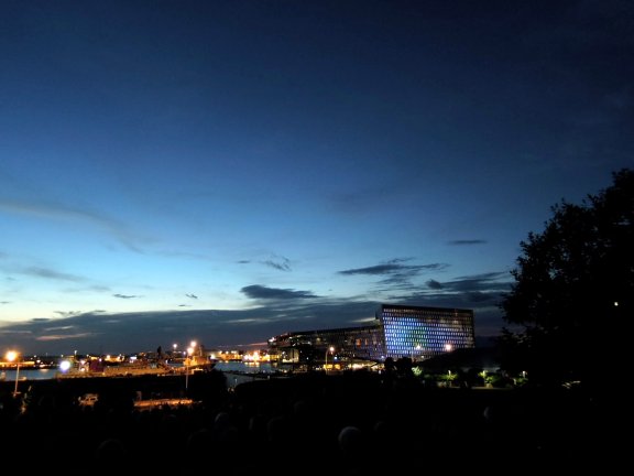 Very crowded downtown at night, with Harpa