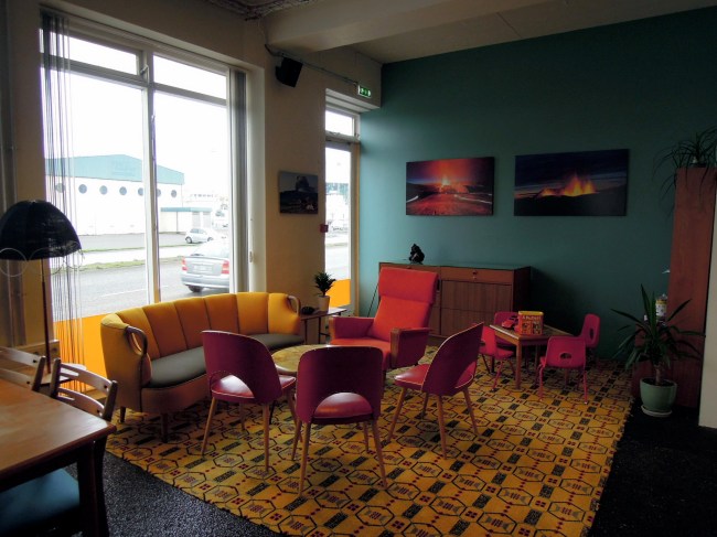 Cozy cafe with colorful midcentury furniture