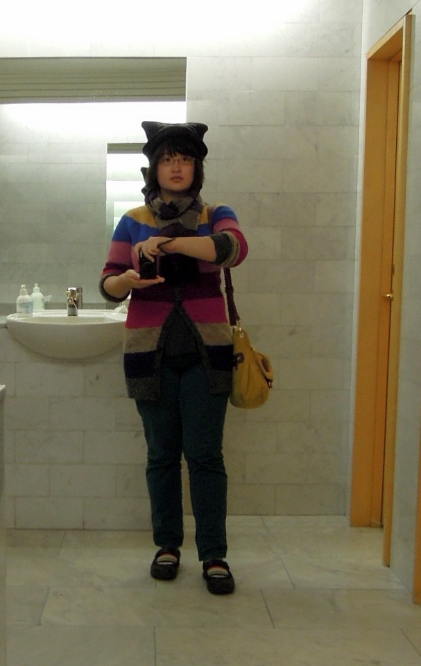 Lisa in cat hat and striped long cardigan