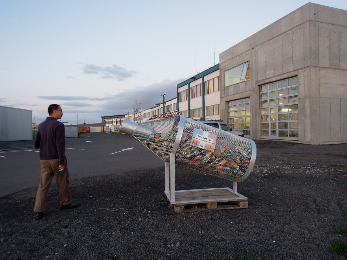 Bottle-shaped recycling bin 