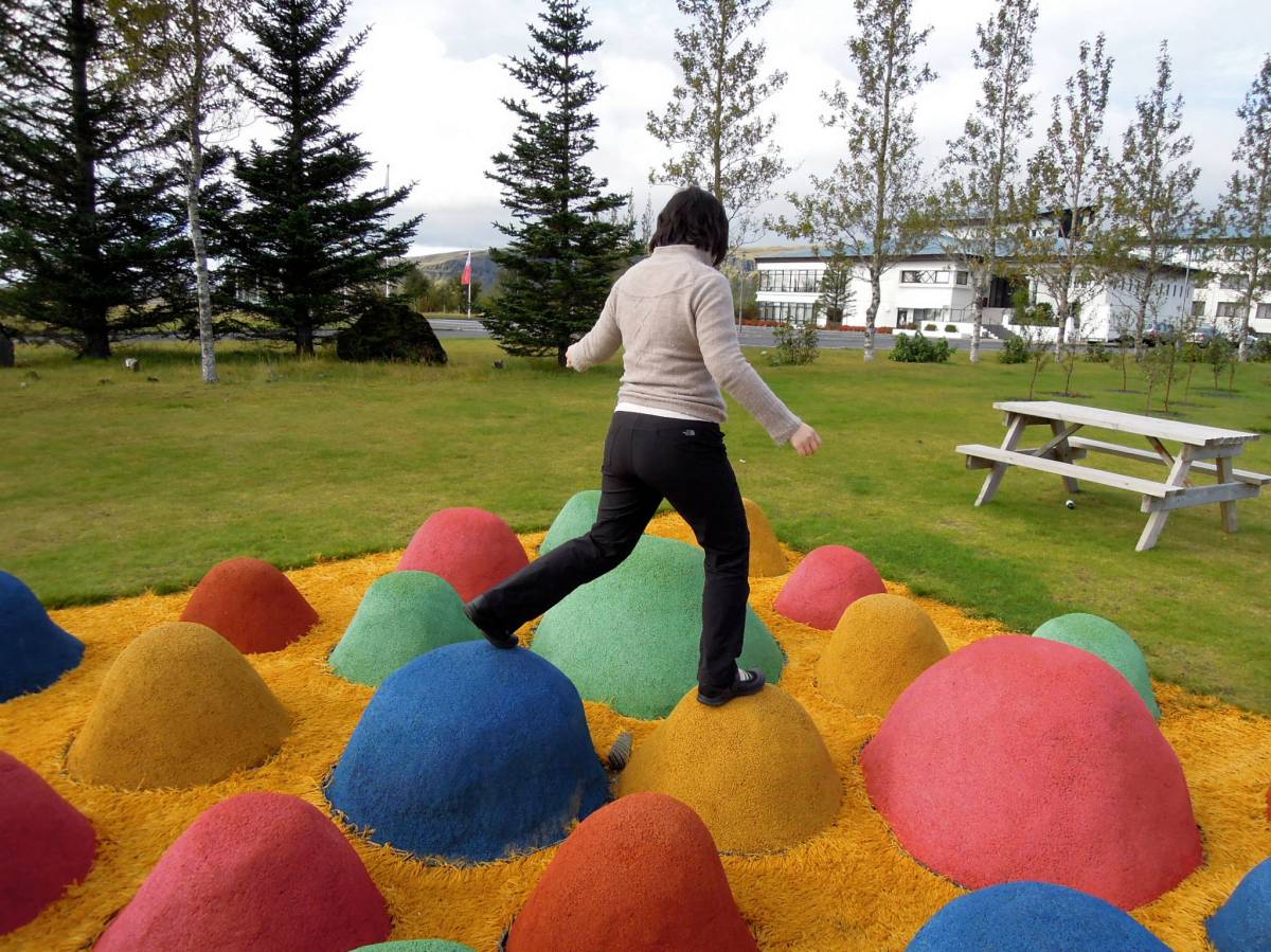 Lisa walking around on the raised colorful mounds