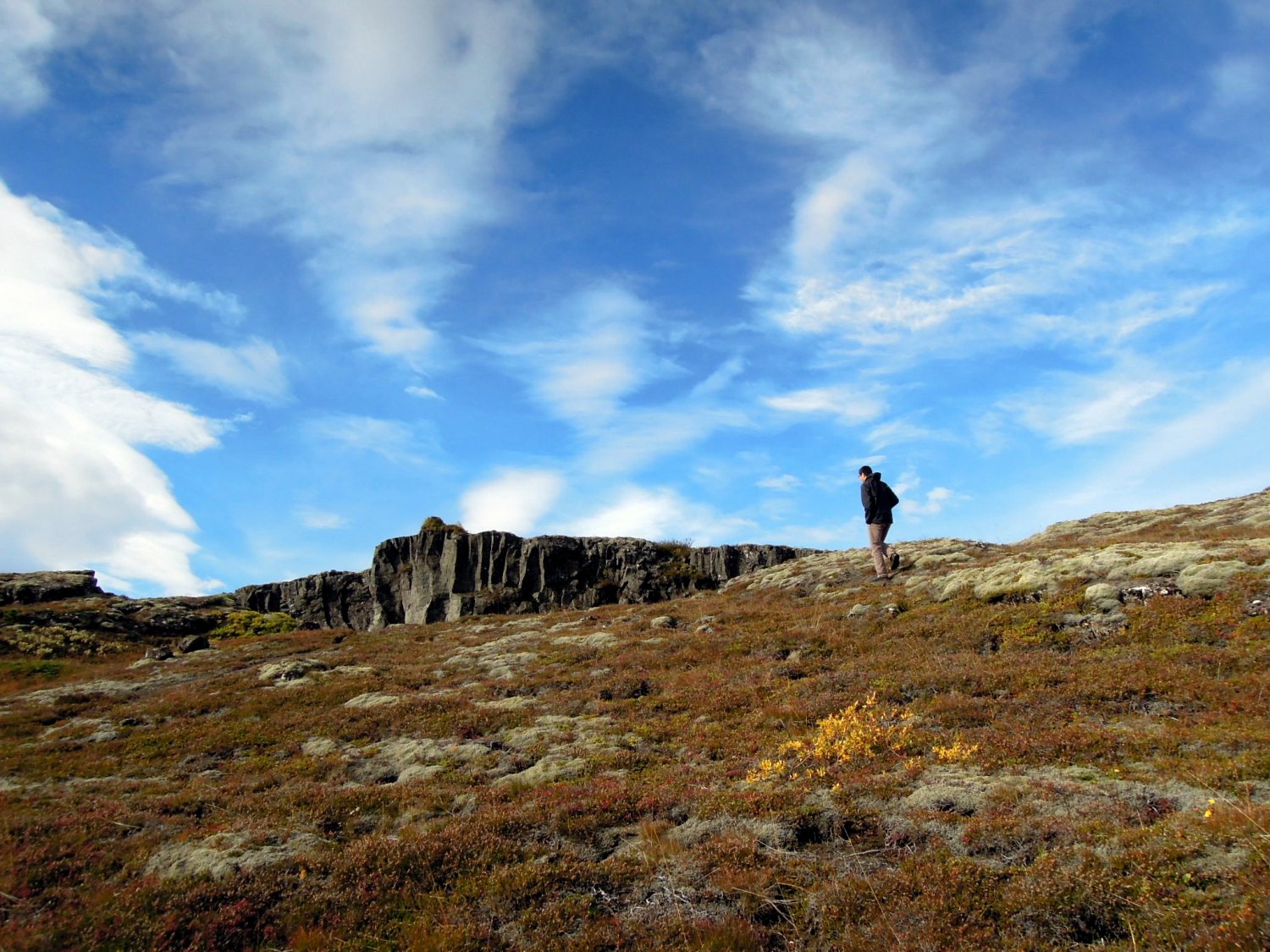 Erik on top of a cliff