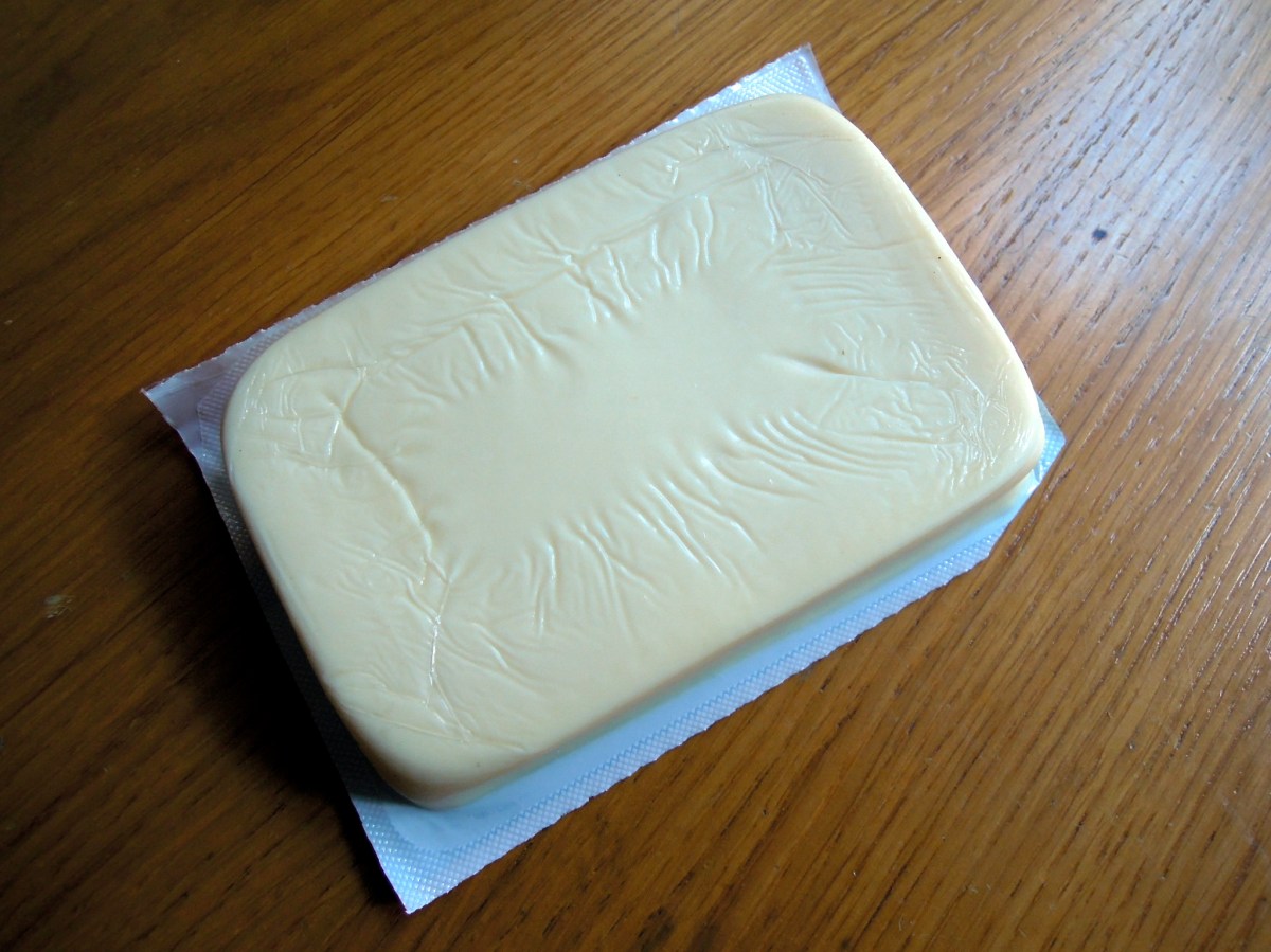 Rectangular pale white-yellow cheese