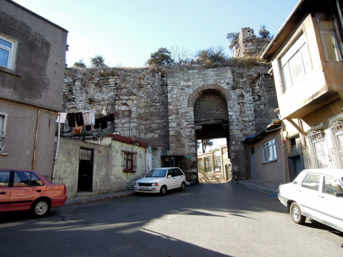 Bit of the old city wall... next to a yard with someone's washing
