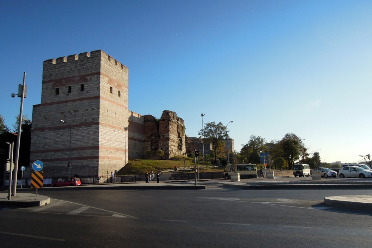 Old city wall and modern city street