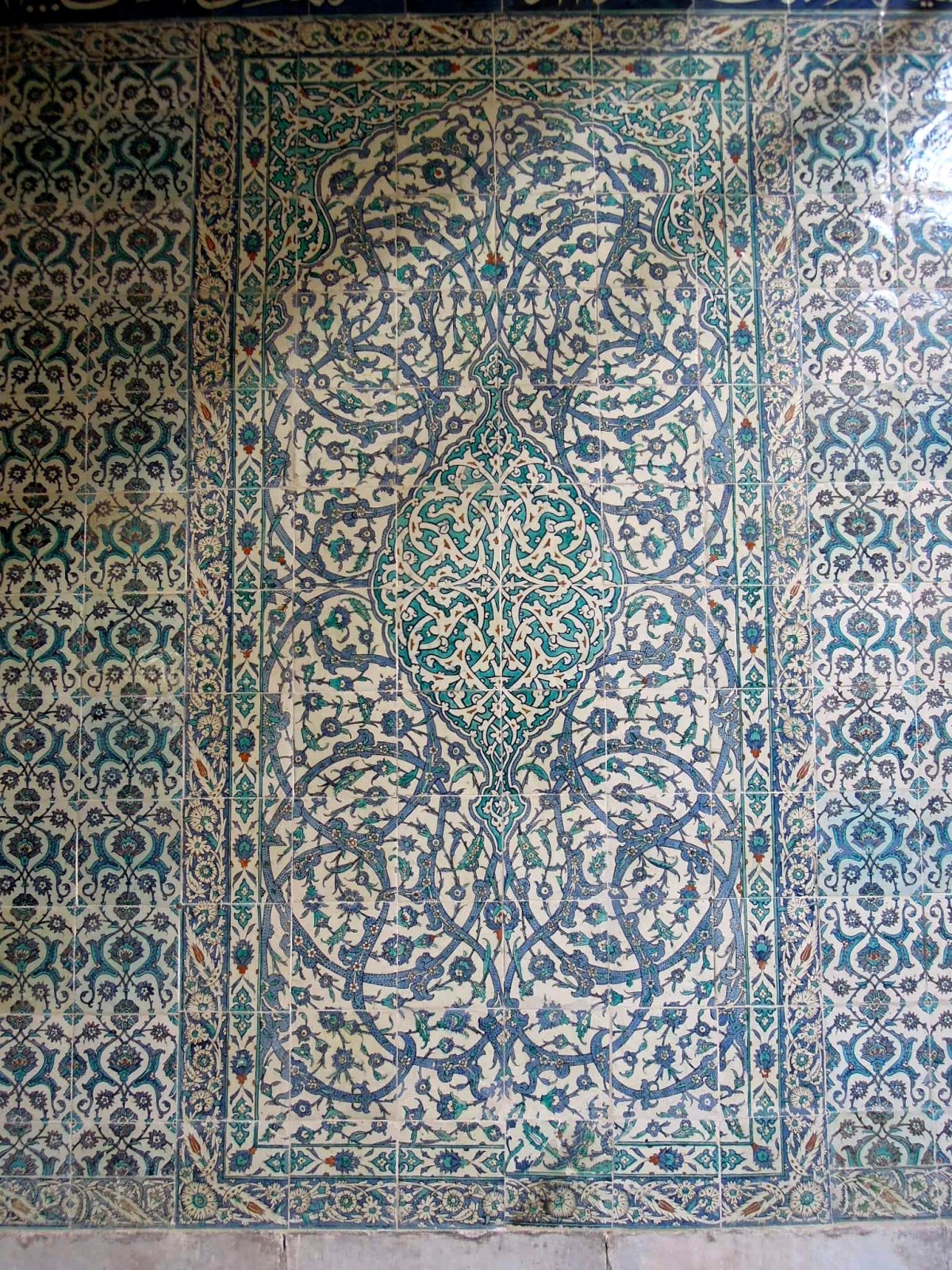 Wall of blue floral tiles