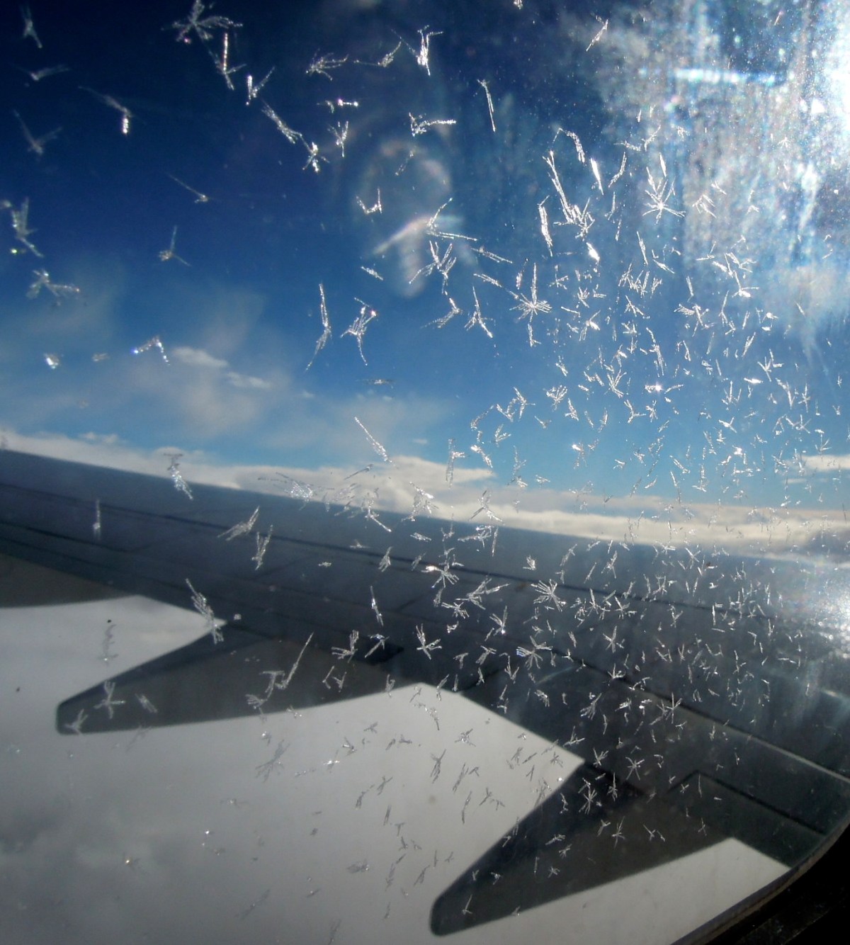 Ice crystals on the airplane window