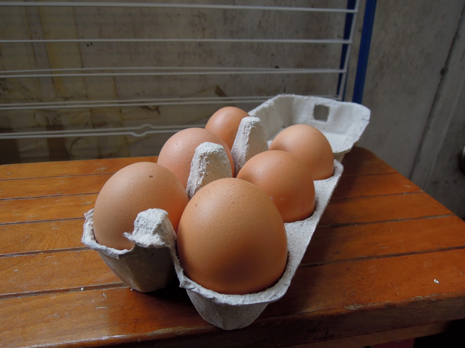 Six brown eggs