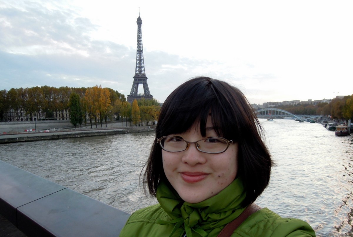 Lisa with the Eiffel Tower in the background