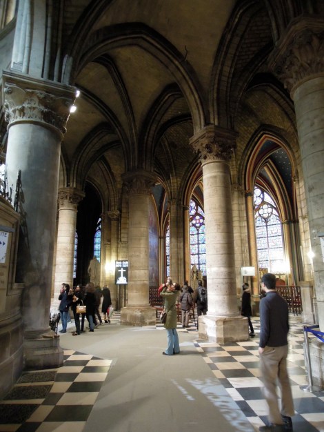 Hallway with more vaulted ceilings