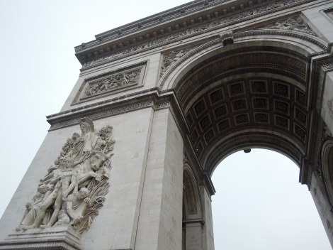 Looking up at the Arc de Triomphe