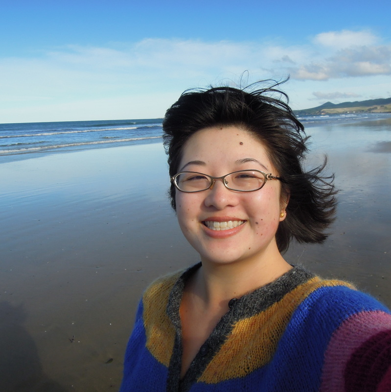 Grinning on the beach