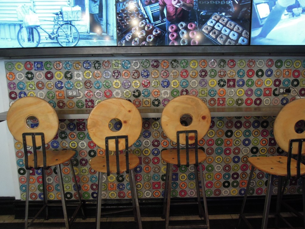 Counter with donut-shaped tiles and chair backs