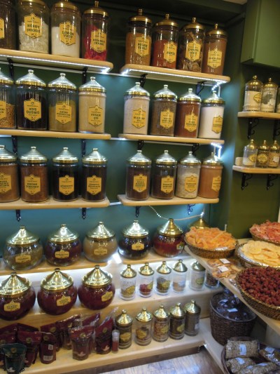 Dried fruit in baskets, herbs and spices in jars. Besiktas Aktari shop, Istanbul