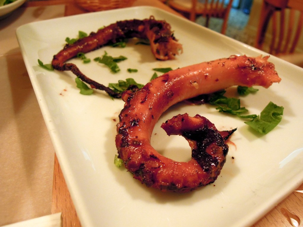 Grilled octopus, Sidika Restaurant, Istanbul. Two grilled octopus tentacles on a plate