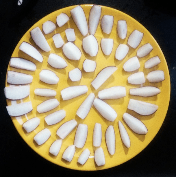 Eatwell Farm radishes on a yellow plate (via Satsumabug on Instagram)