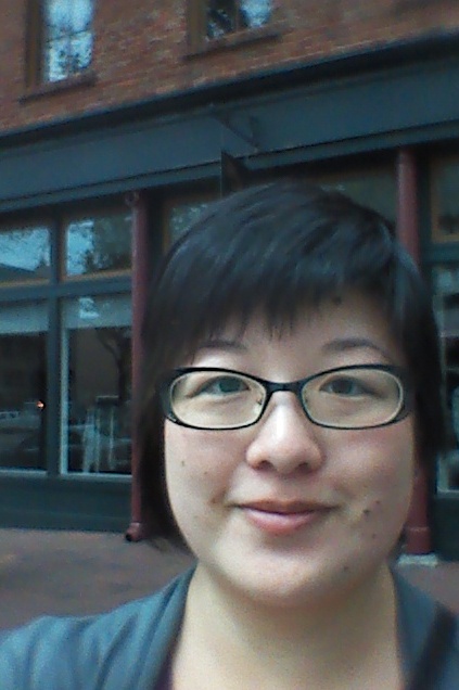 Lisa standing on the sidewalk