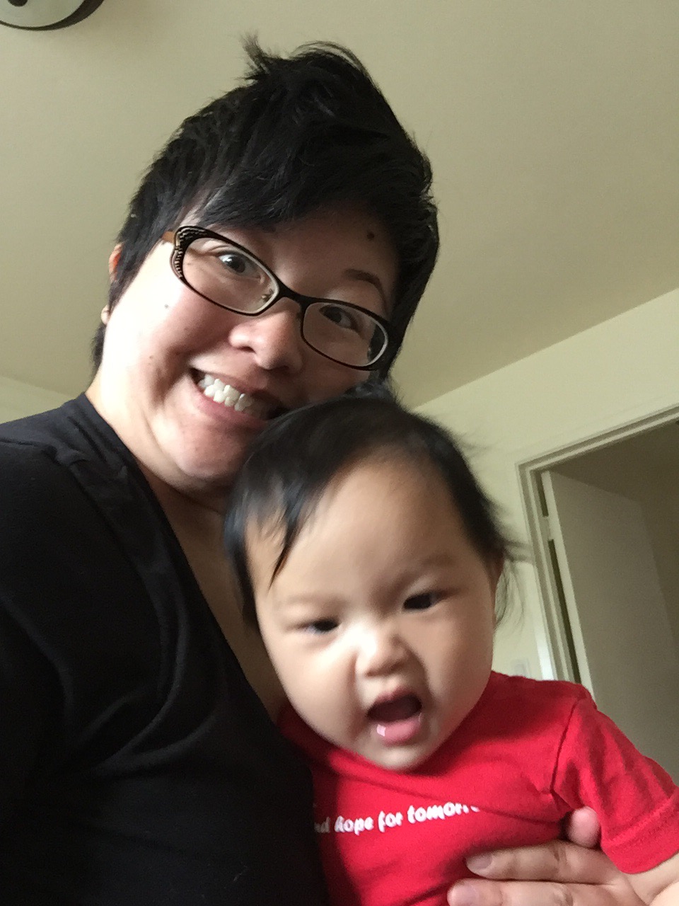 Lisa mugging with baby Ada