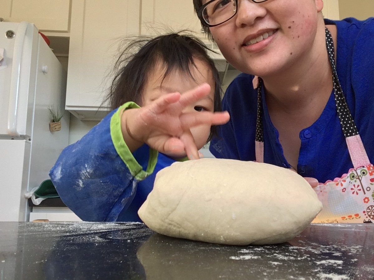 Lisa and 16-month-old Ada prodding a