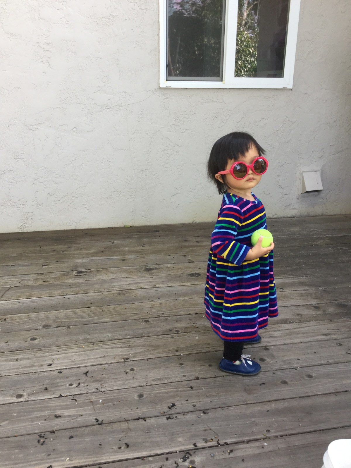 Toddler in red sunglasses
