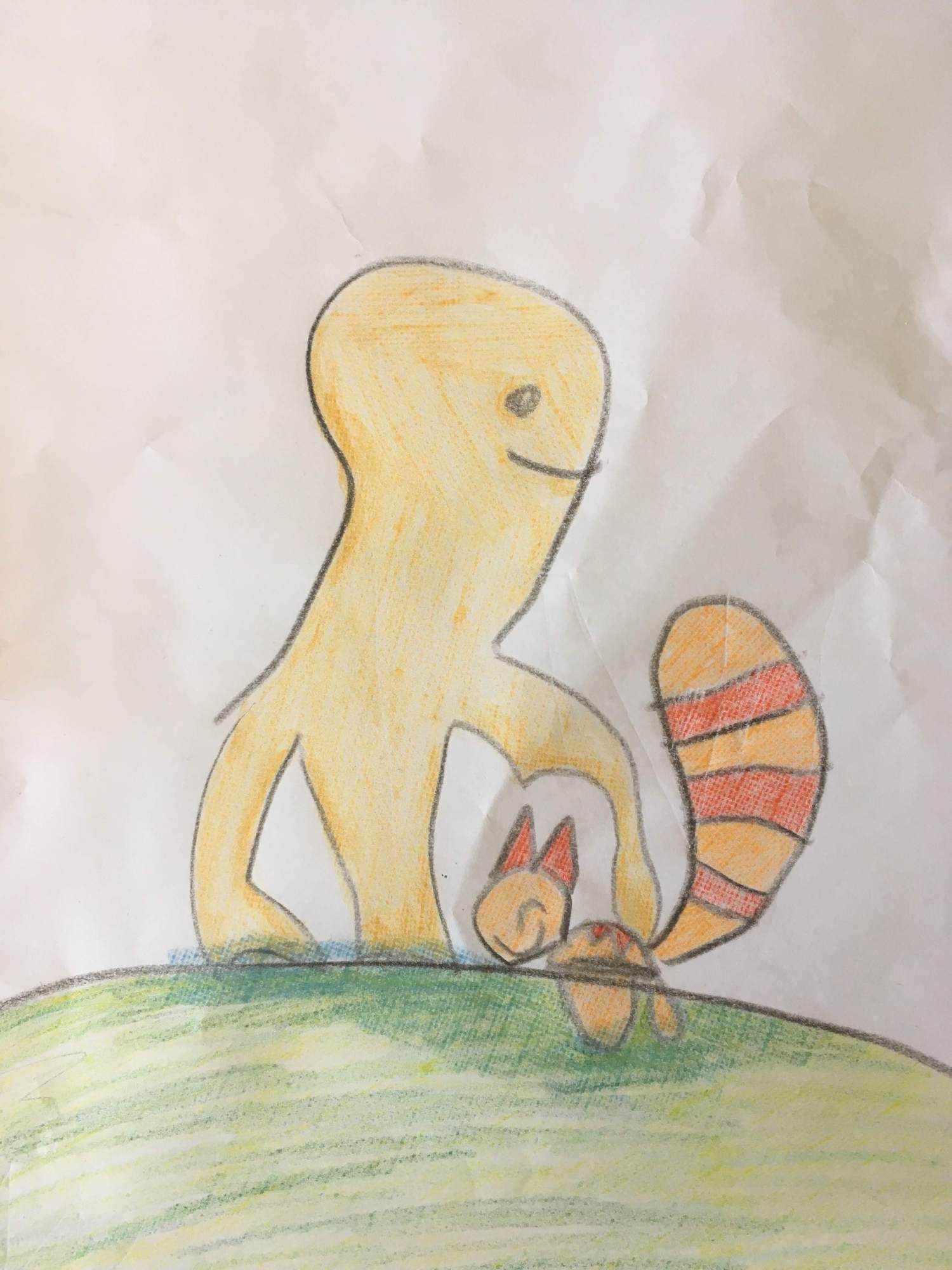 A 4-year-old's drawing of two creatures embracing