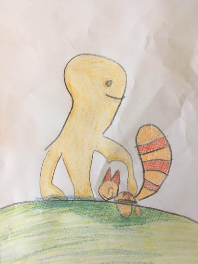 A 4-year-old's drawing of two creatures embracing