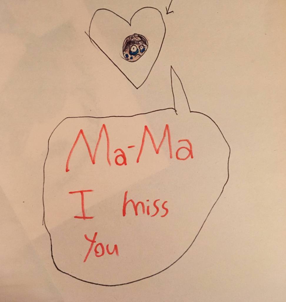 Child's drawing reading "Ma-Ma I miss you"